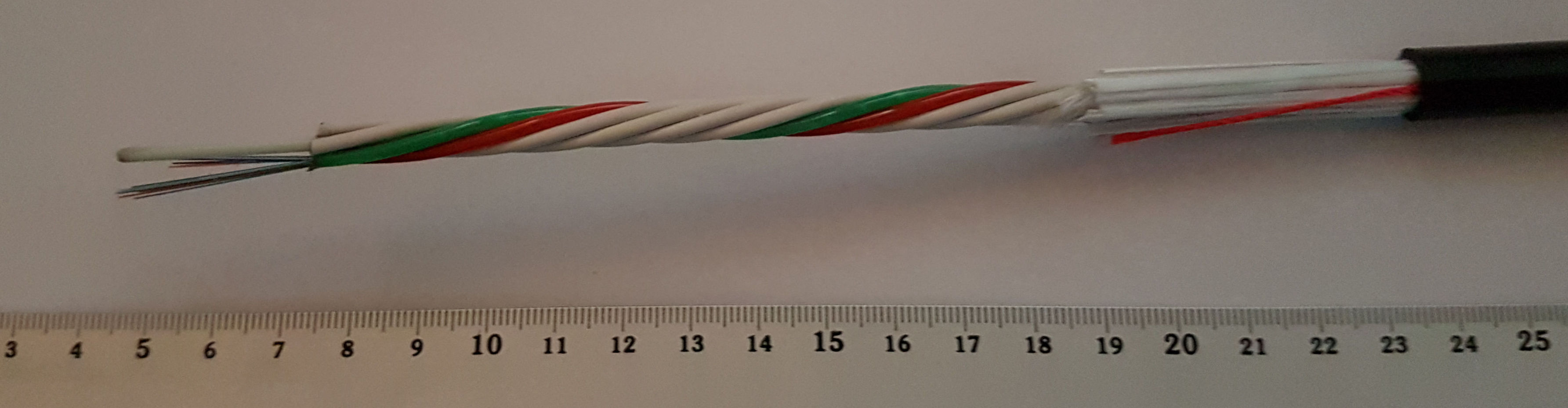 An optical fiber cable and its exposed internal strands.