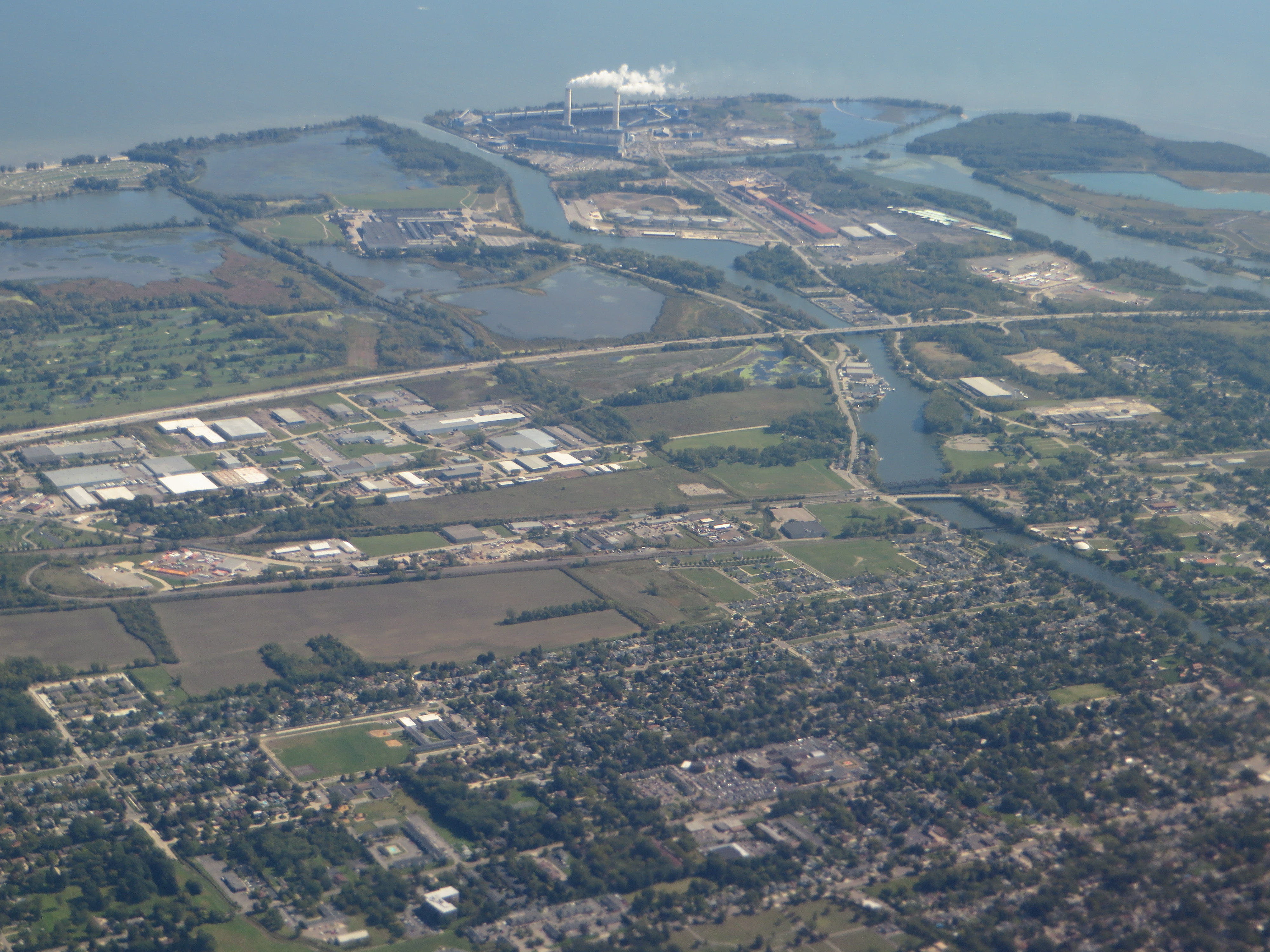 Aerial view of the River Raisin and surrounding Monroe landscape near Lake Erie.