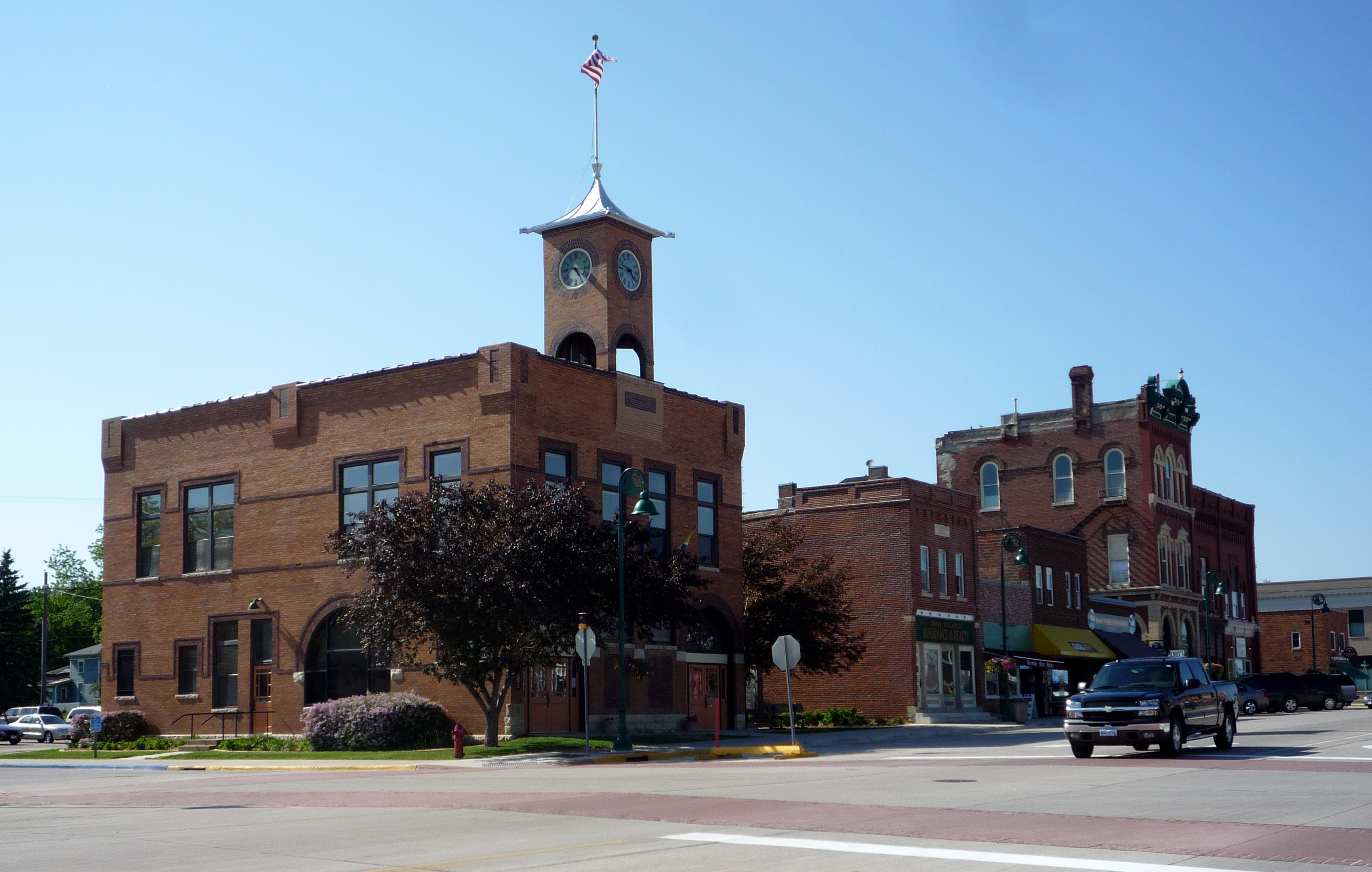 Pine Island downtown buildings with city hall at the left.
