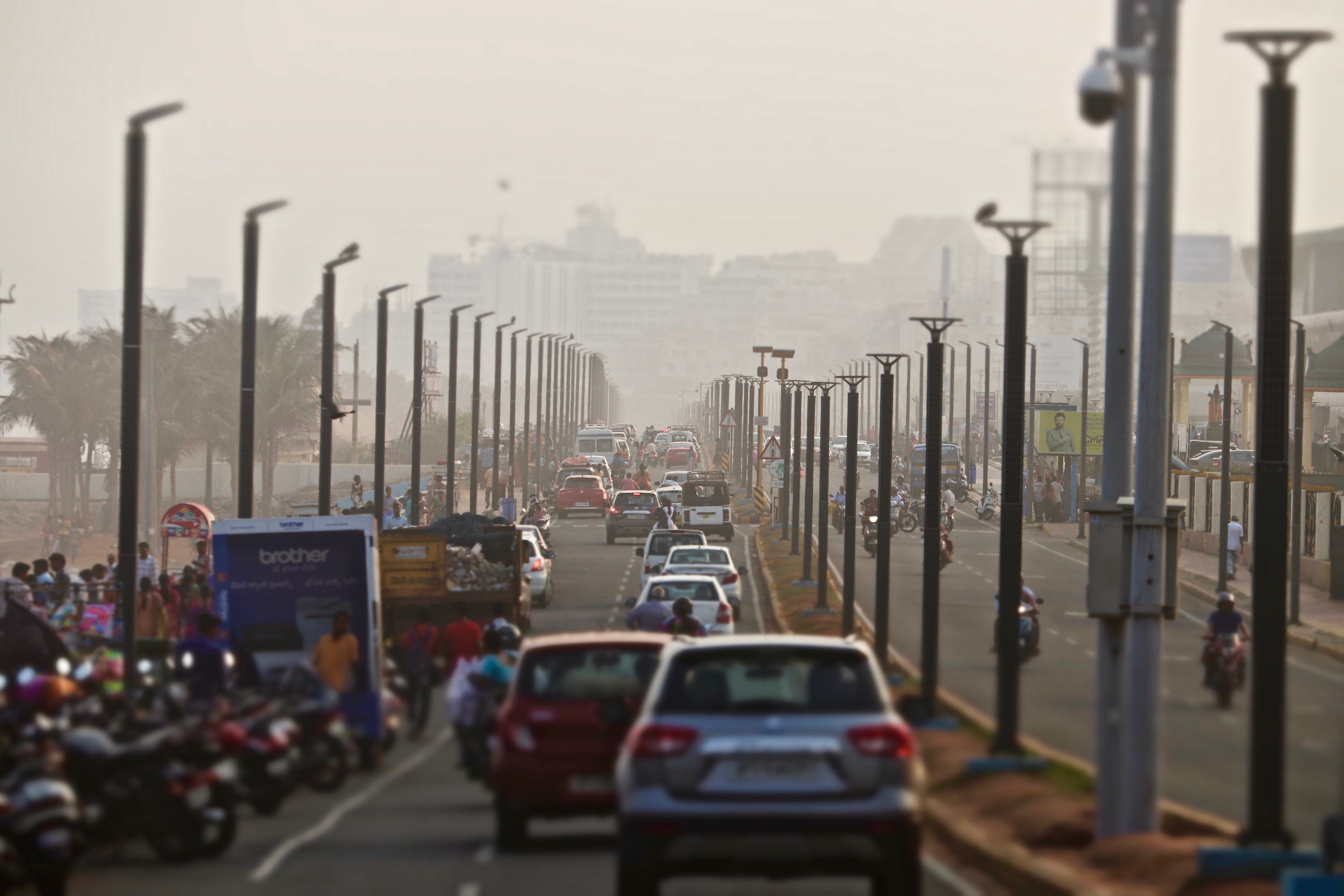 Traffic and pedestrians along Visakhapatnam’s beach road.